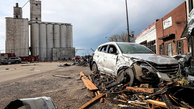 {p}Damaged buildings and vehicles after a tornado struck Perryton, Texas, June 15, 2023. (David Erickson/AP){/p}