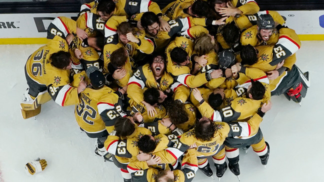 Vegas Golden Knights players celebrate after defeating the Florida Panthers to win the Stanley Cup in Game 5 of the NHL hockey Stanley Cup Finals, Tuesday, June 13, 2023, in Las Vegas. (AP Photo/Abbie Parr)
